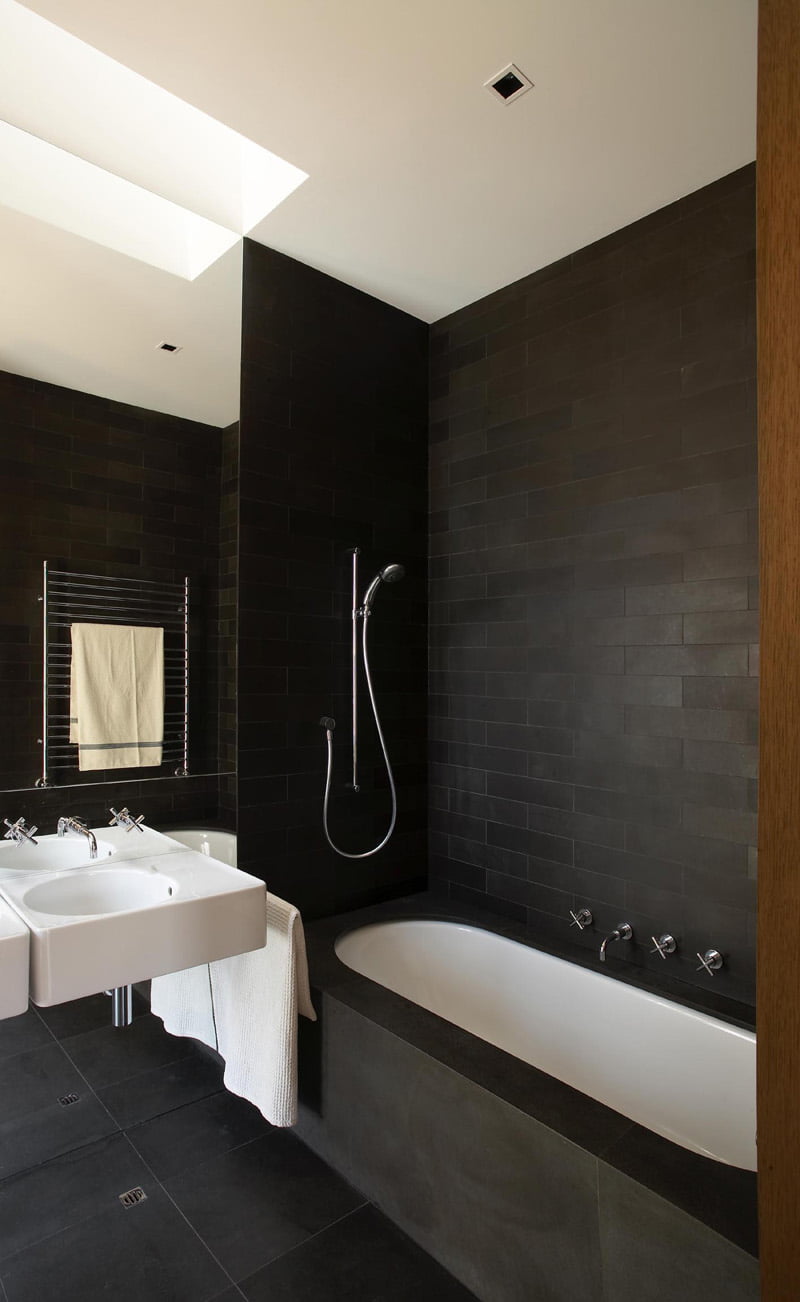 black and white bathroom is from a house in Sydney, Australia, designed by Rice Design