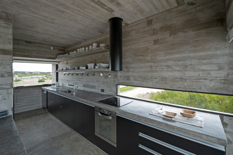 exposed concrete modern house kitchen with modern cabinate