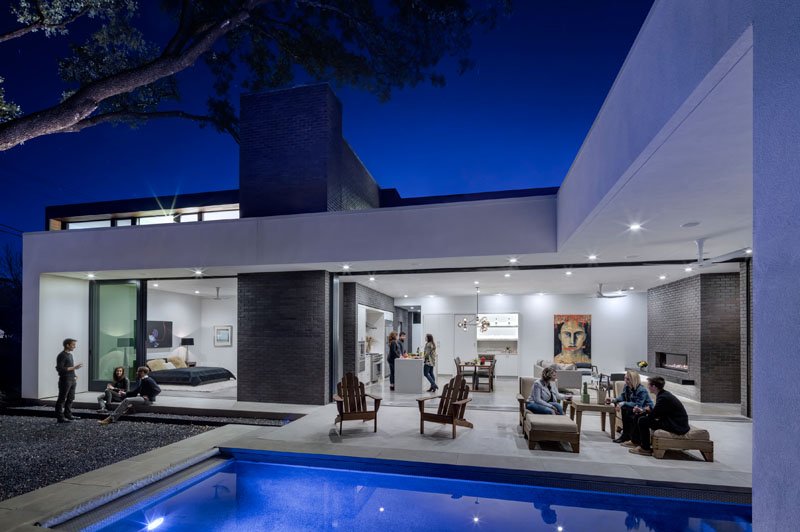 Pool side cool lighting on deck area in modern house