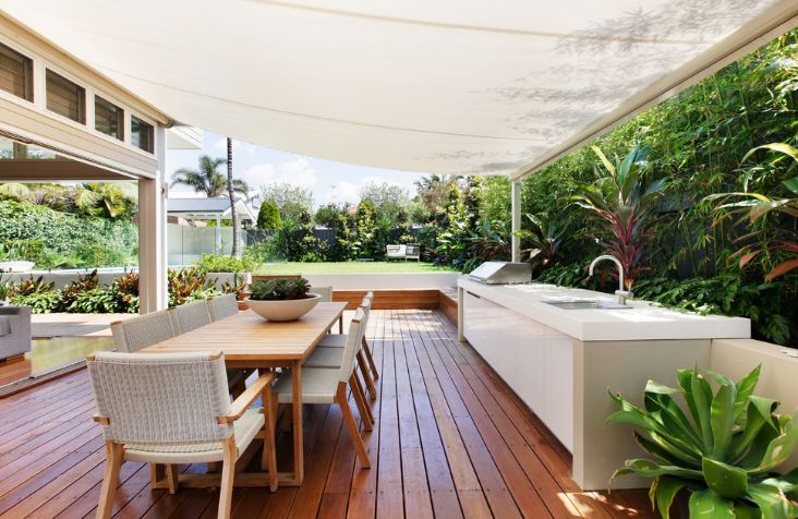 Outdoor wooden deck with kitchen design in modern design touch