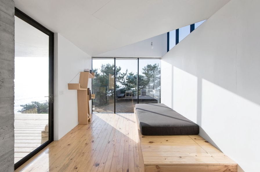 minimalist interior design in modern white cube home