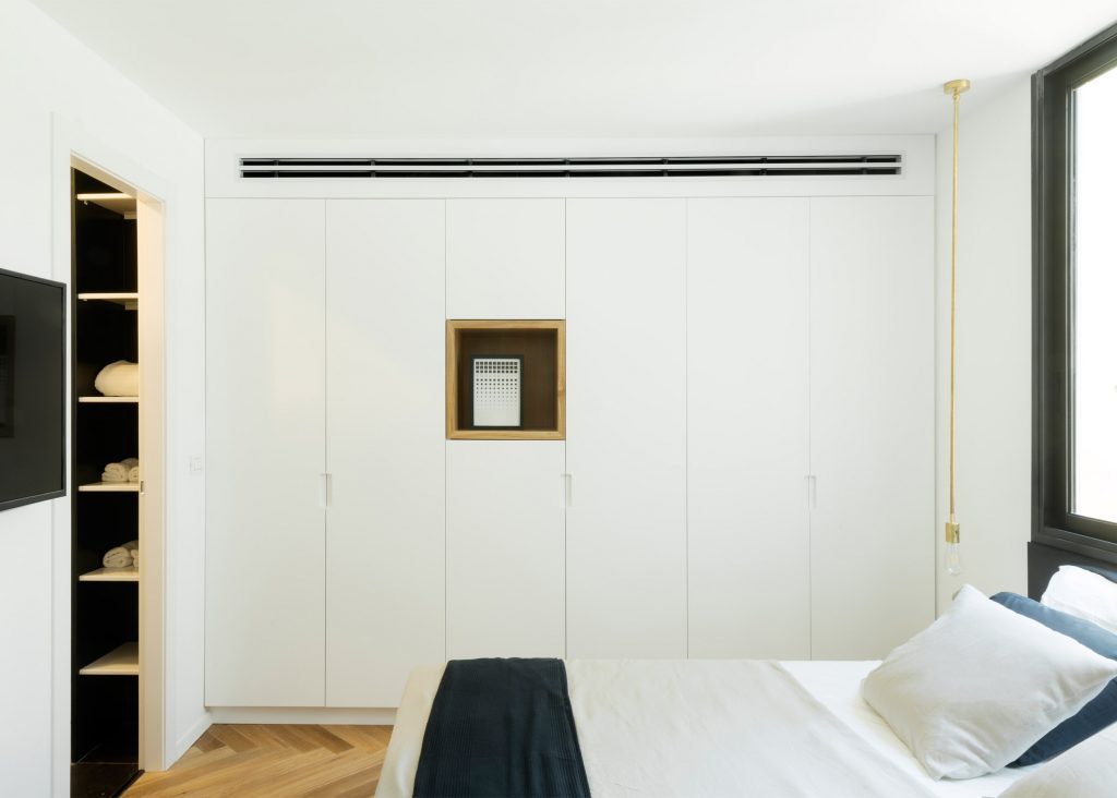 White Bedroom wardrobe Ideas for Contemporary Apartment Interior.